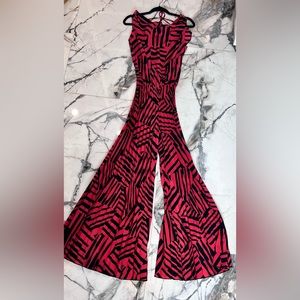 Jumpsuit with lunged front and open back with tie and wide legs